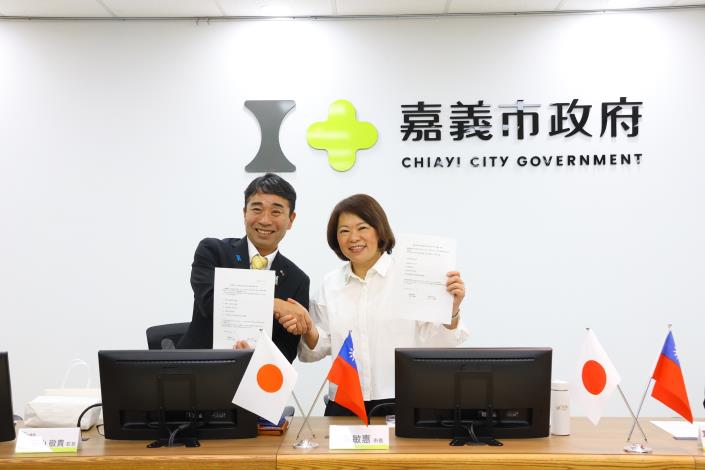 0 黃敏惠市長與加美町長石山敬貴合影.JPG